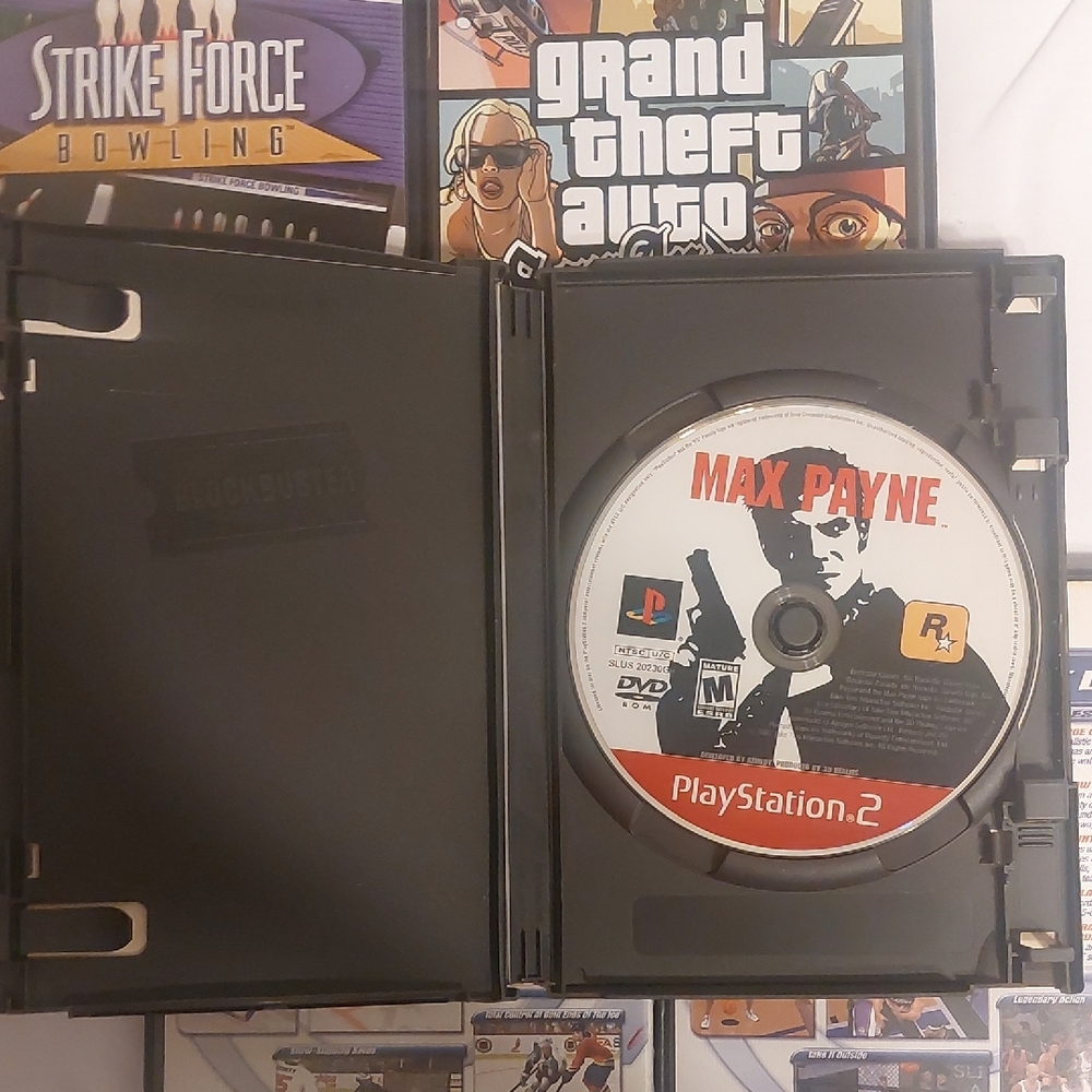 Sony PlayStation 2 Game Collection - Black, Orange, White - Picture 5 of 7